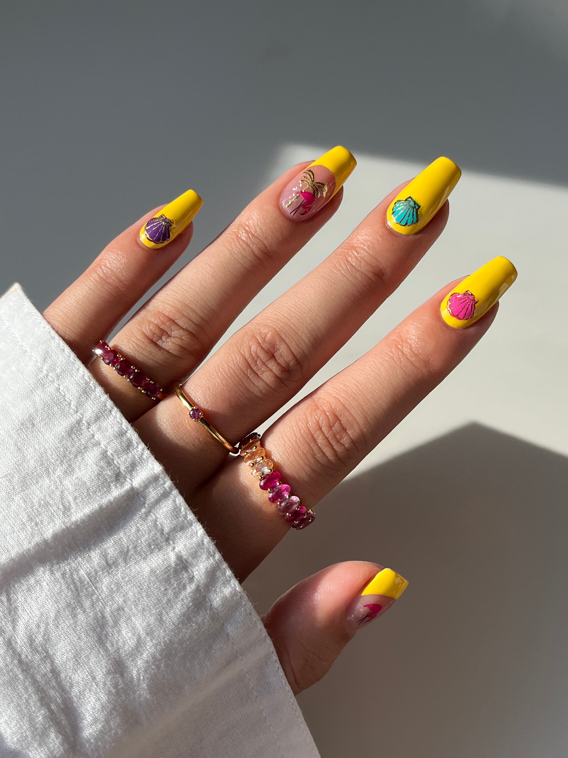 Beach themed mani with yellow tips