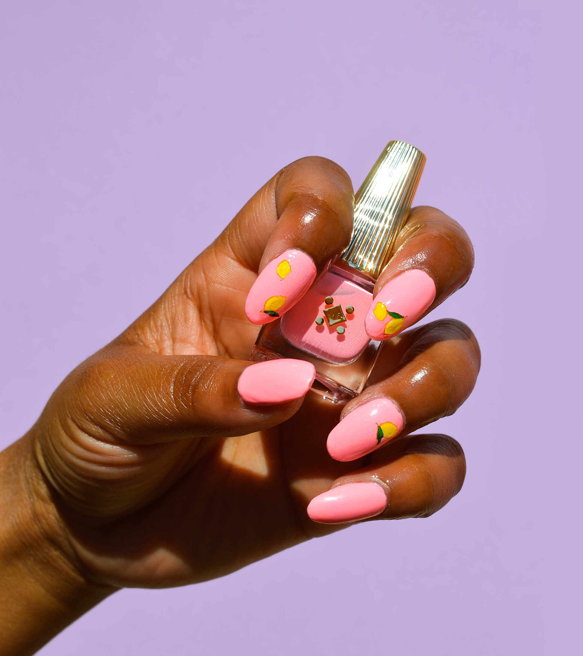 pink nail polish with lemons