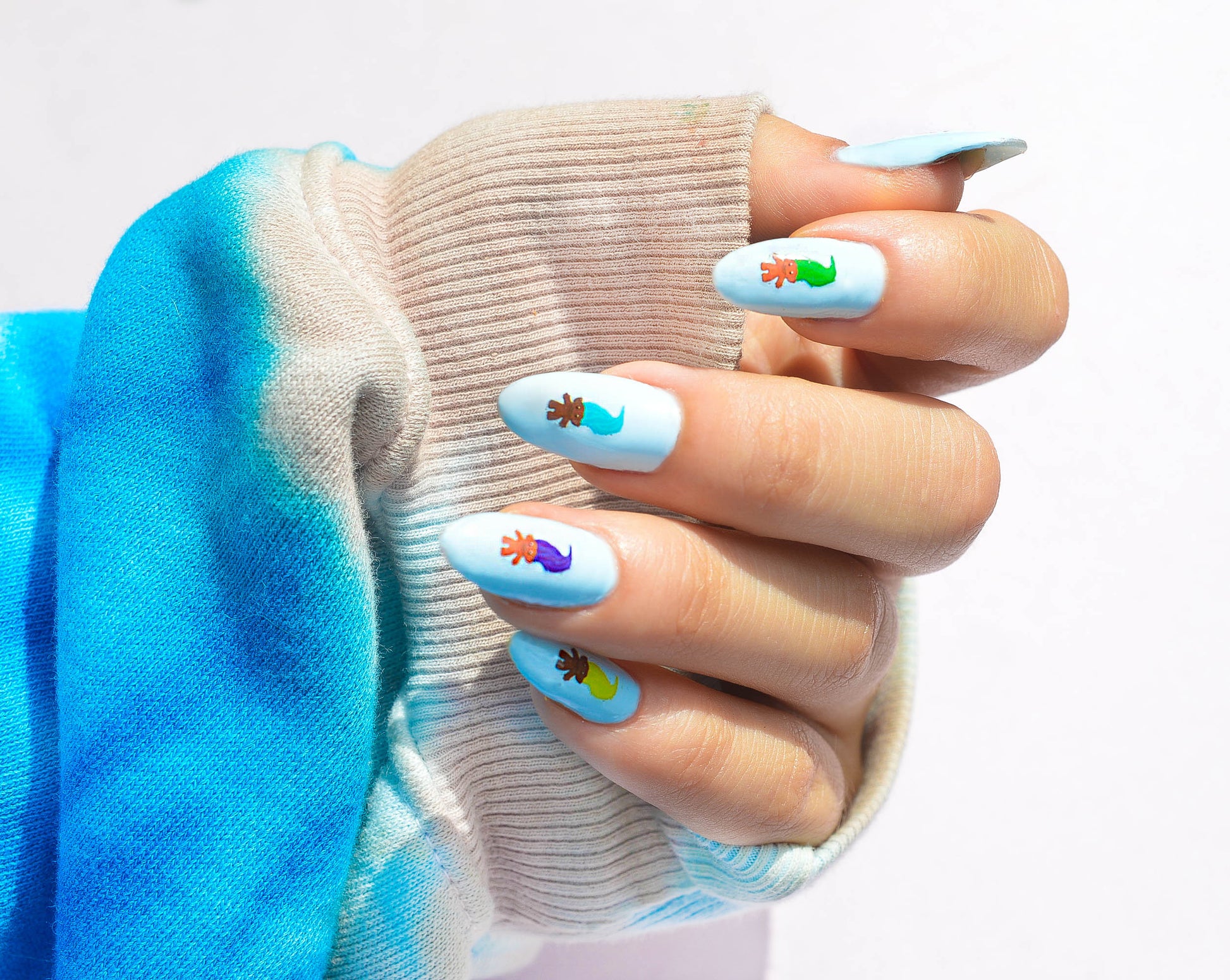 blue nails with troll art
